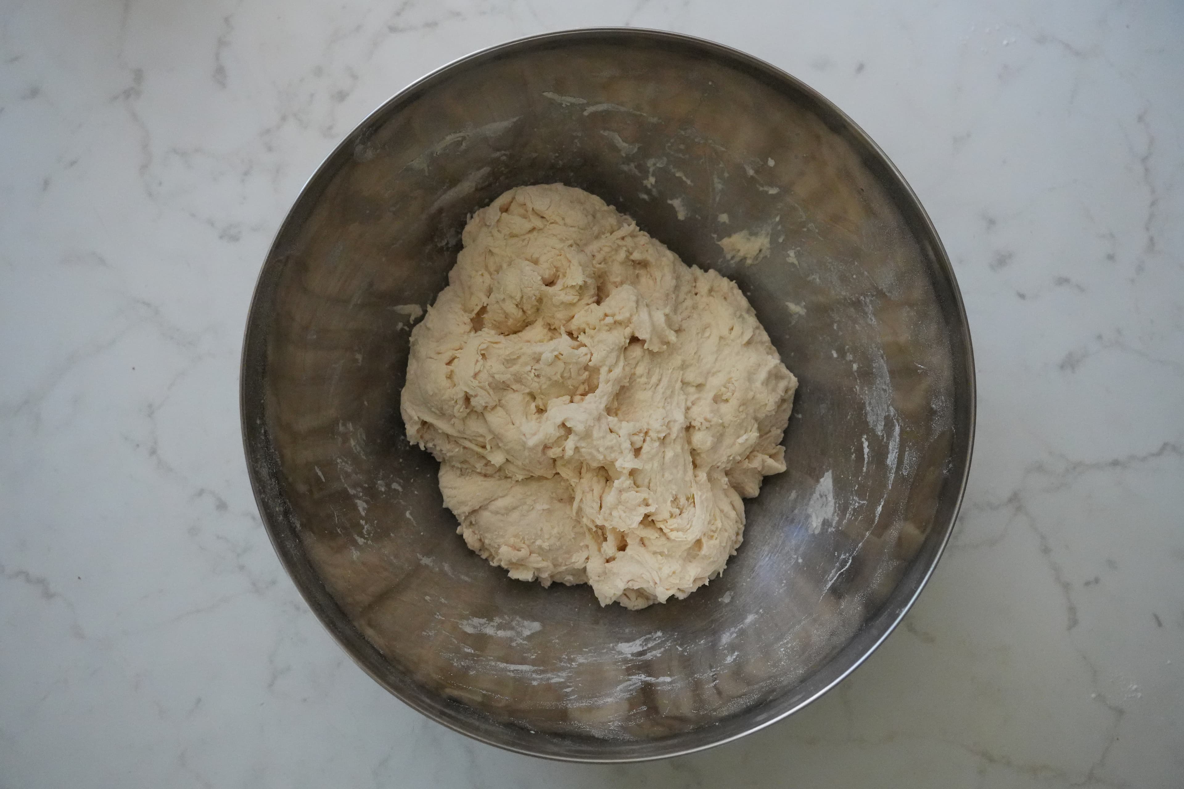 Dough before stretch and folds, resting in the bowl.